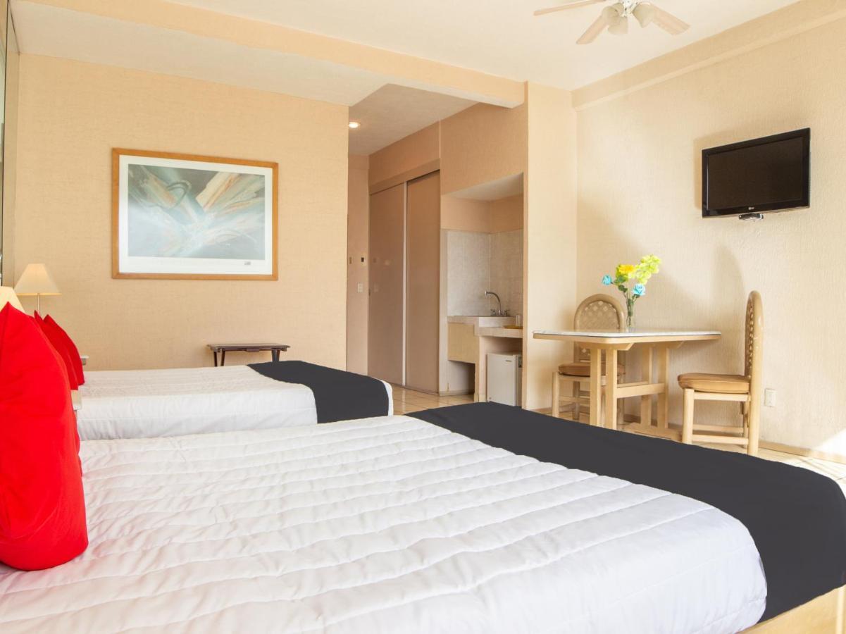 Capital O Hotel Villa Monini Puebla de Zaragoza Esterno foto
