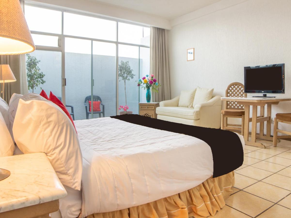 Capital O Hotel Villa Monini Puebla de Zaragoza Esterno foto