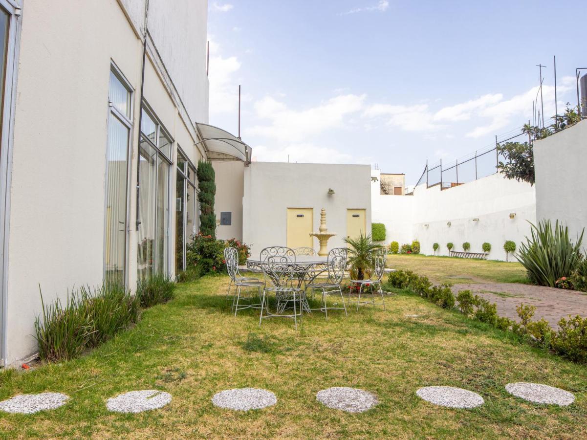 Capital O Hotel Villa Monini Puebla de Zaragoza Esterno foto