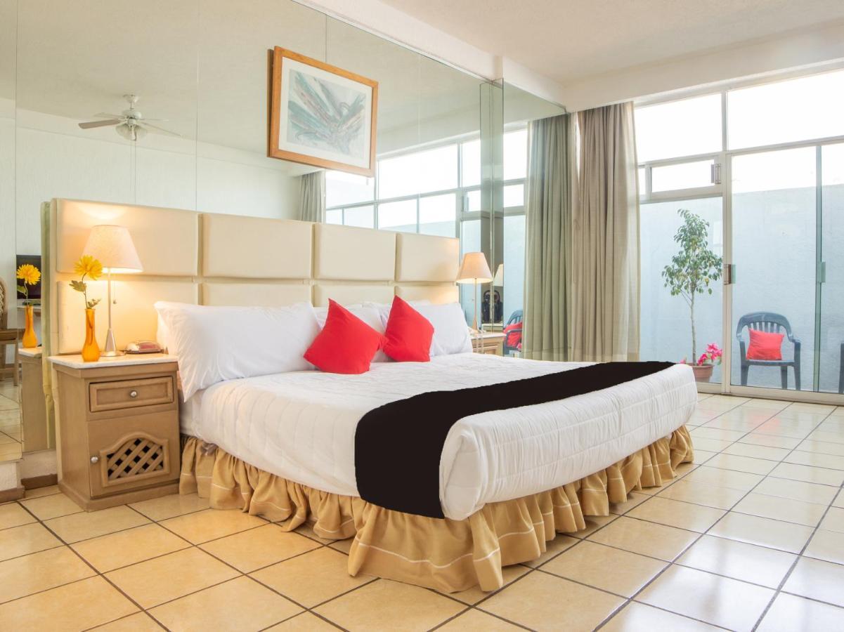 Capital O Hotel Villa Monini Puebla de Zaragoza Esterno foto